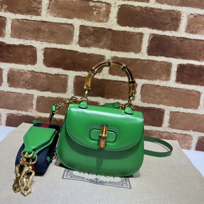 G*u*i top handle bags
